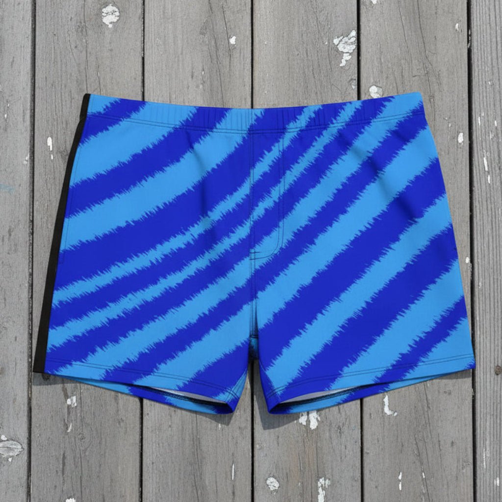 Blue striped swim trunks on rustic nautical wood surface