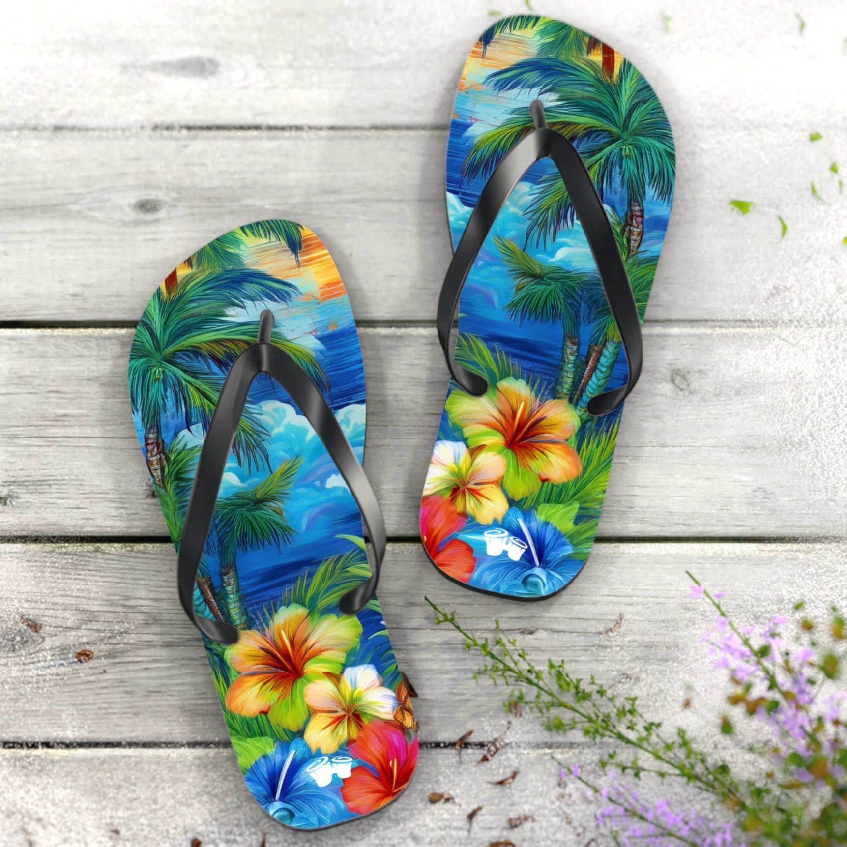 Colorful Hawaiian flip-flops with tropical design on a wooden surface