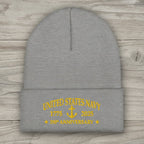 A heather gray knit beanie with a folded cuff featuring yellow embroidered text that reads 'UNITED STATES NAVY 1775 2025 250th ANNIVERSARY' with an anchor graphic.