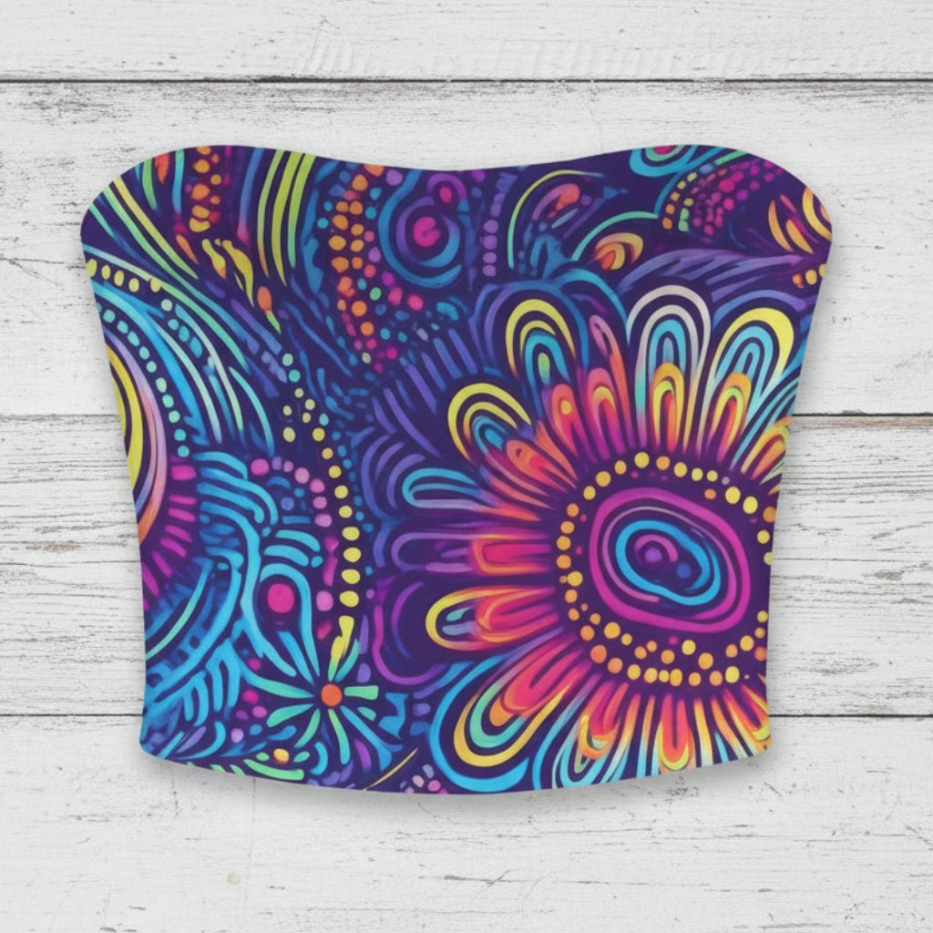 Colorful strapless top with a vibrant pattern on a rustic wood background