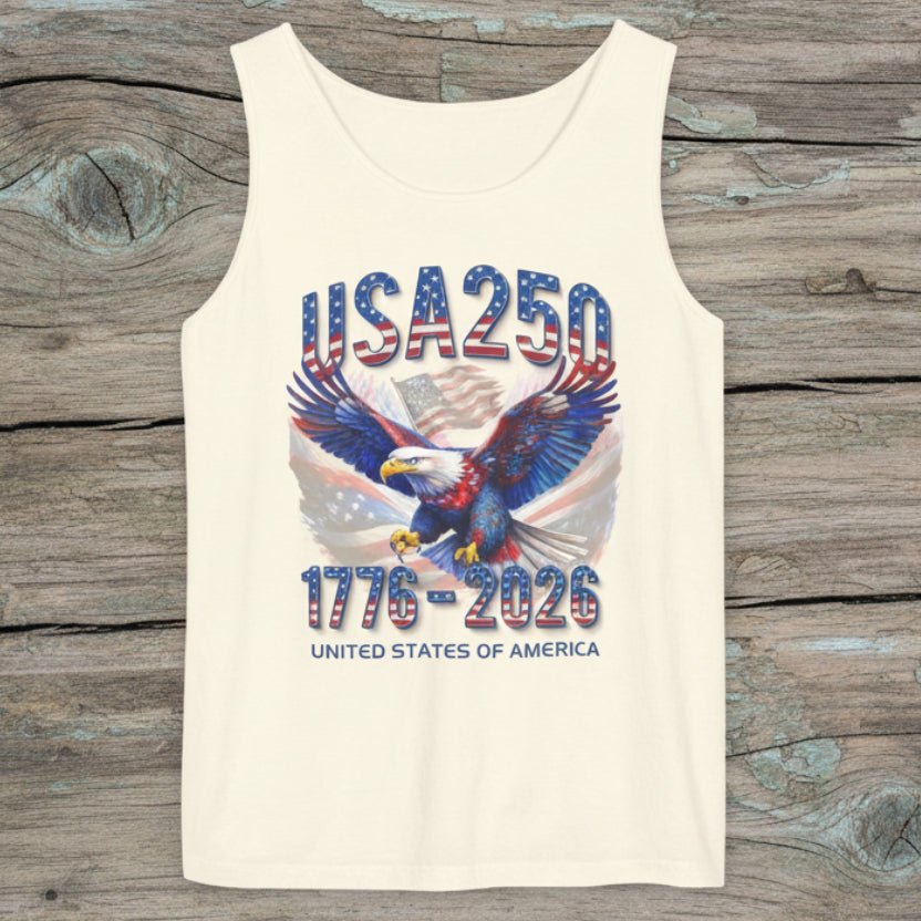 Beige tank top with USA 250 design featuring an eagle and text on a rustic wood background