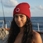 Lady wearing a red Shark Jaws Fisherman's Hat on a charter boat