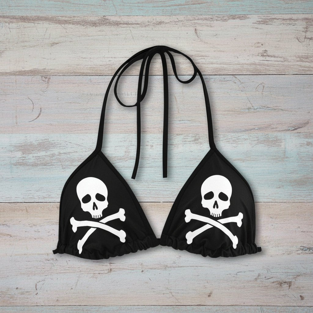 Black bikini top with skull and crossbones design on a white background