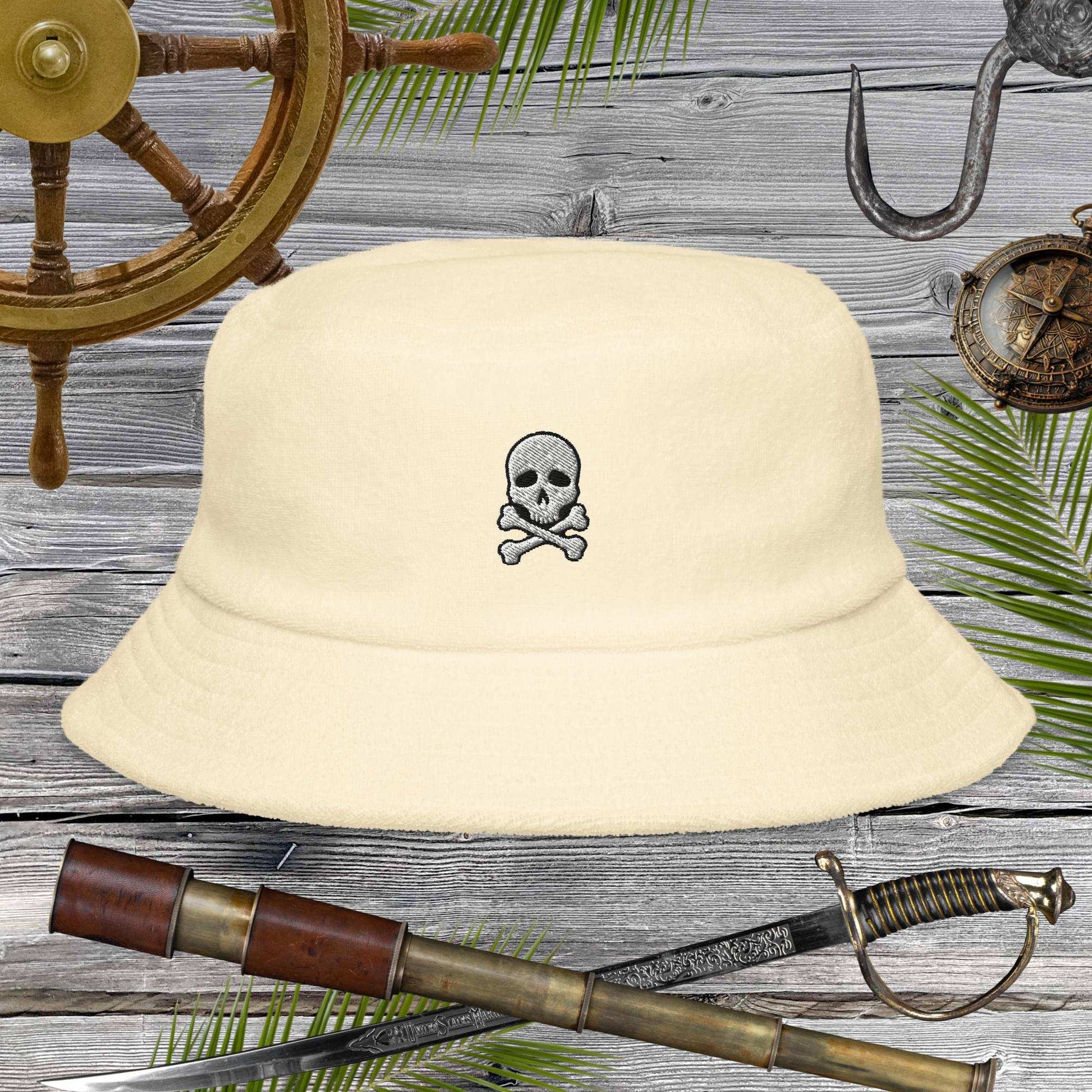 Jolly Pirate Flag Bucket Hat made of unstructured terry cloth with a skull and crossbones design, perfect for sunny adventures.
