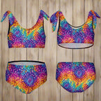 Colorful tie-dye bikini set  front and back over a nautical wood background