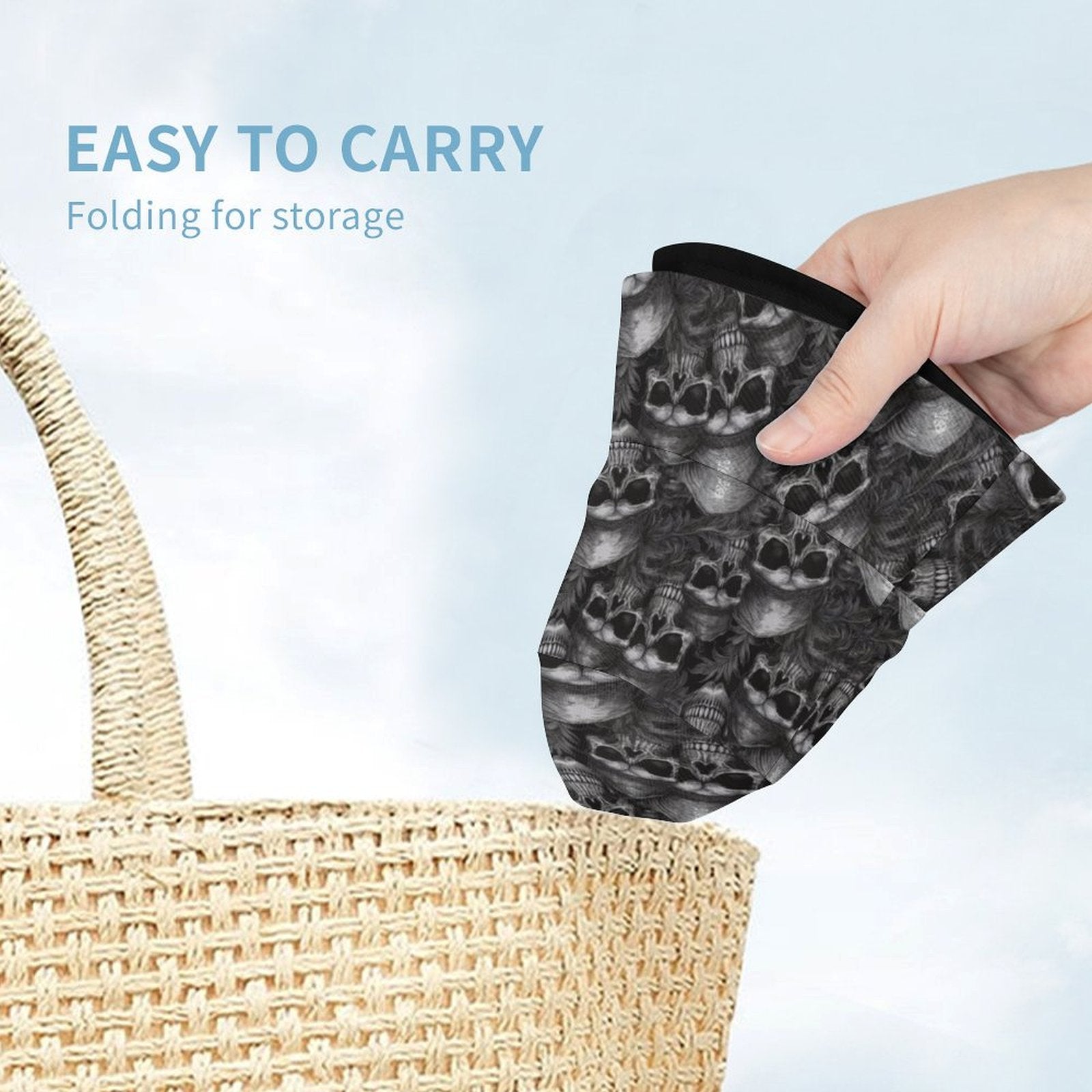 Hand holding a folded black and white patterned bucket hat next to a woven bag with text 'Easy to carry, folding for storage'.