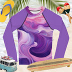 Vibrant lavender and pink kids rash guard with wave pattern, perfect for beach play with UPF 50+ protection.