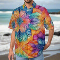 Man wearing a colorful floral aloha hawaiian shirt standing on a beach on the Big Island in Hawaii