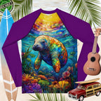 Colorful sun rashie with a manatee design on a tropical background with surfboard, ukulele, and vintage toy car.