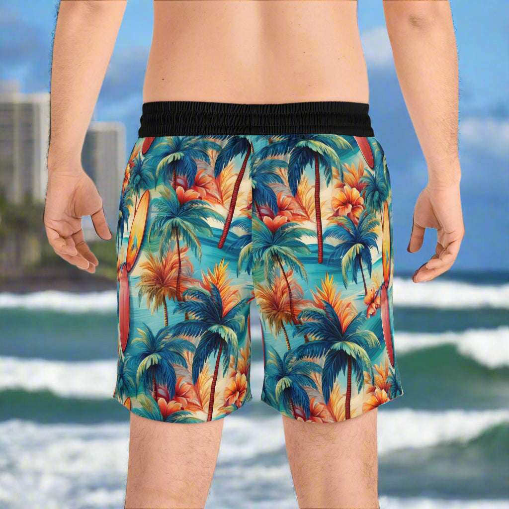 Surfer's backside as he watches the tide come in in Honolulu