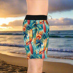 Side View of Surfer Standing on the beach in Honolulu wearing cool board shorts from Bongo Beachwear