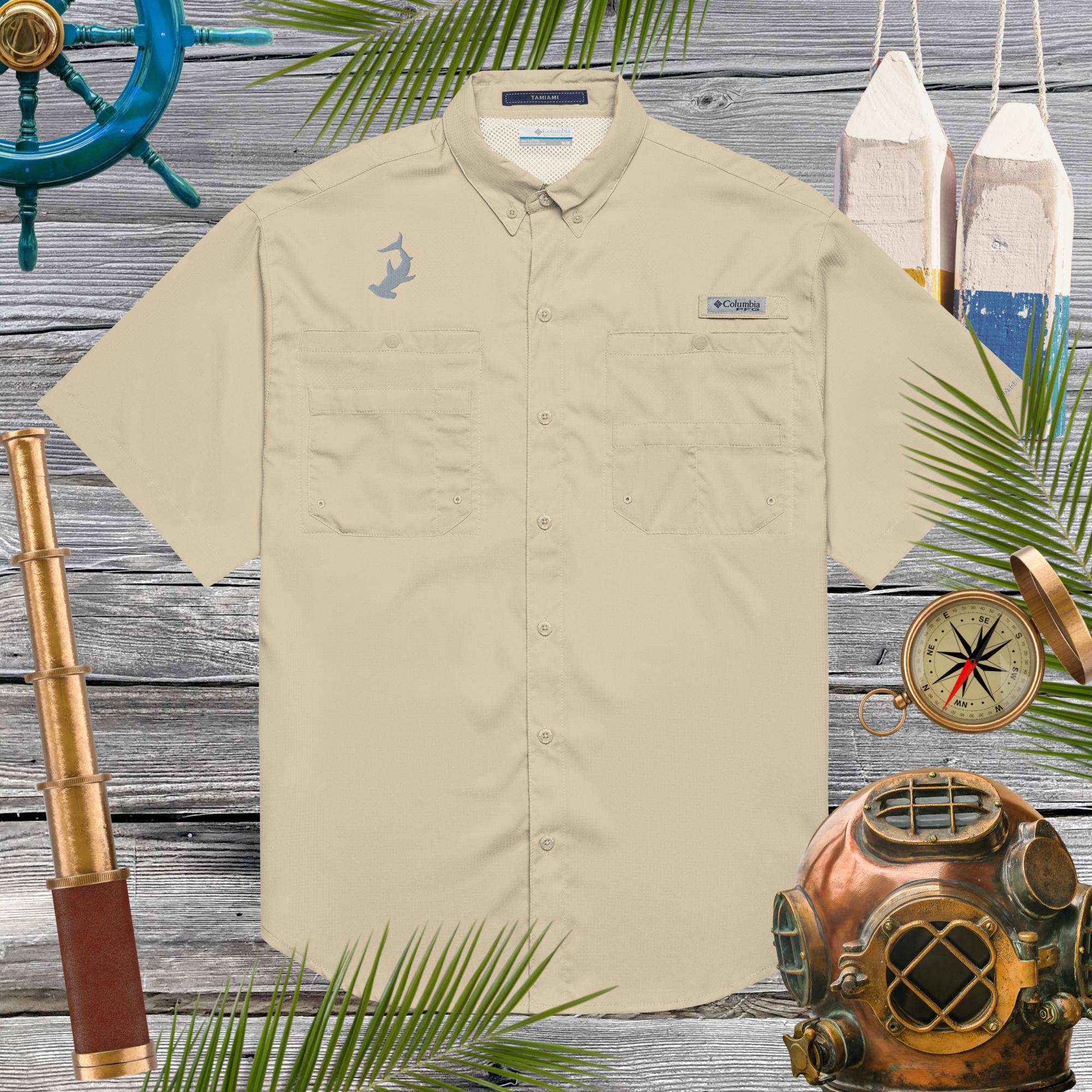 Men’s Columbia Hammerhead Fishing Shirt Shirts. a tan fishing shirt with cool gray hammerhead shark embroidery. 