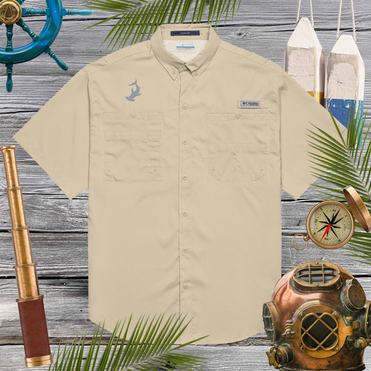 Men’s Columbia Hammerhead Fishing Shirt Shirts. a tan fishing shirt with cool gray hammerhead shark embroidery. 
