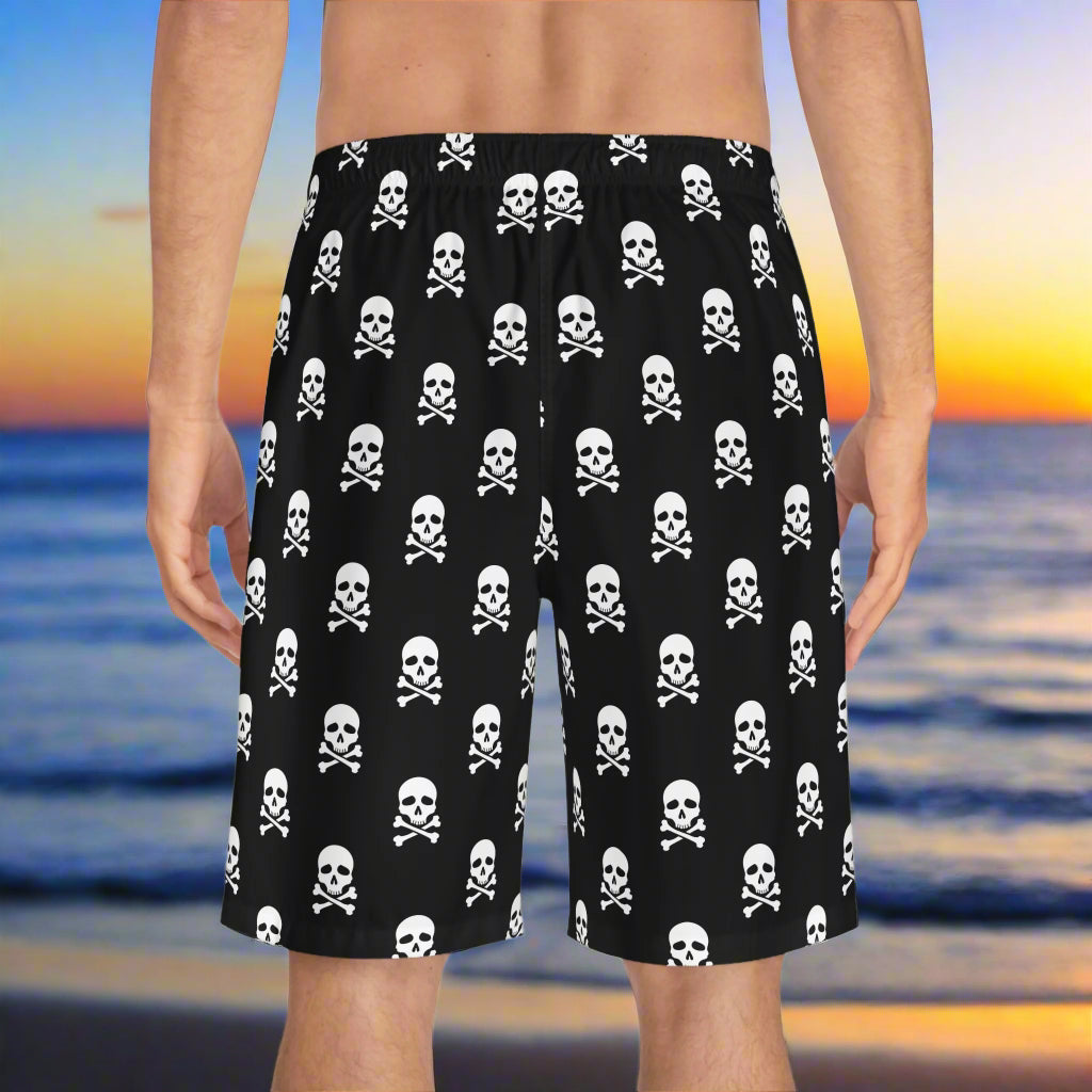 back of men's bathing shorts worn by a surfer waiting for high tide