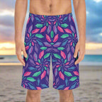 junonia seashell shorts for men worn by a guy standing on a beach looking for rare seashells