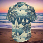 Short-sleeve button-up shirt with a tropical design featuring sailboats and palm trees on a beach sunset background.