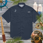 Men’s Columbia Fishing Shirt Shirt in navy with cool hammerhead shark embroidery floating over a rustic wood nautical backdrop