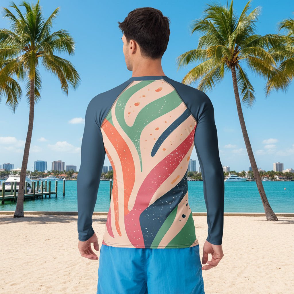 Dude wearing a colorful long-sleeve shirt with abstract design on a white background