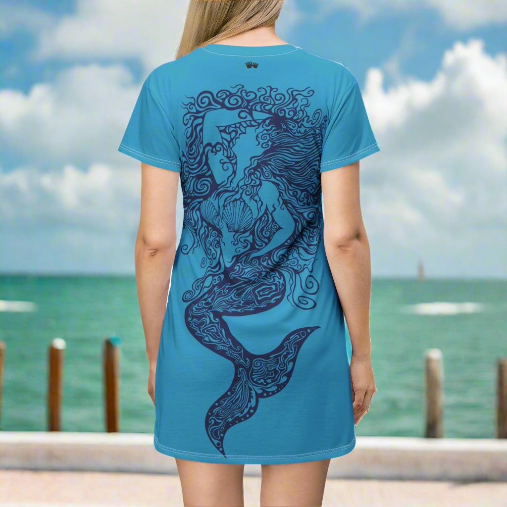Swimwear model wearing a Bongo Beachwear mermaid bathing suit cover looking out over the ocean in Key West
