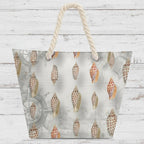 Tote bag with shell pattern and rope handle on a rustic wood background