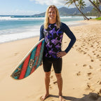 surfer dude wearing a long-sleeve rash guard with purple fish skeleton pattern on North Shore Beach Oahu