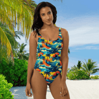 Swimsuit Model Wearing a Hawaiian Dreams One-Piece Swimsuit Surreal Island Pattern by Bongo Beachwear