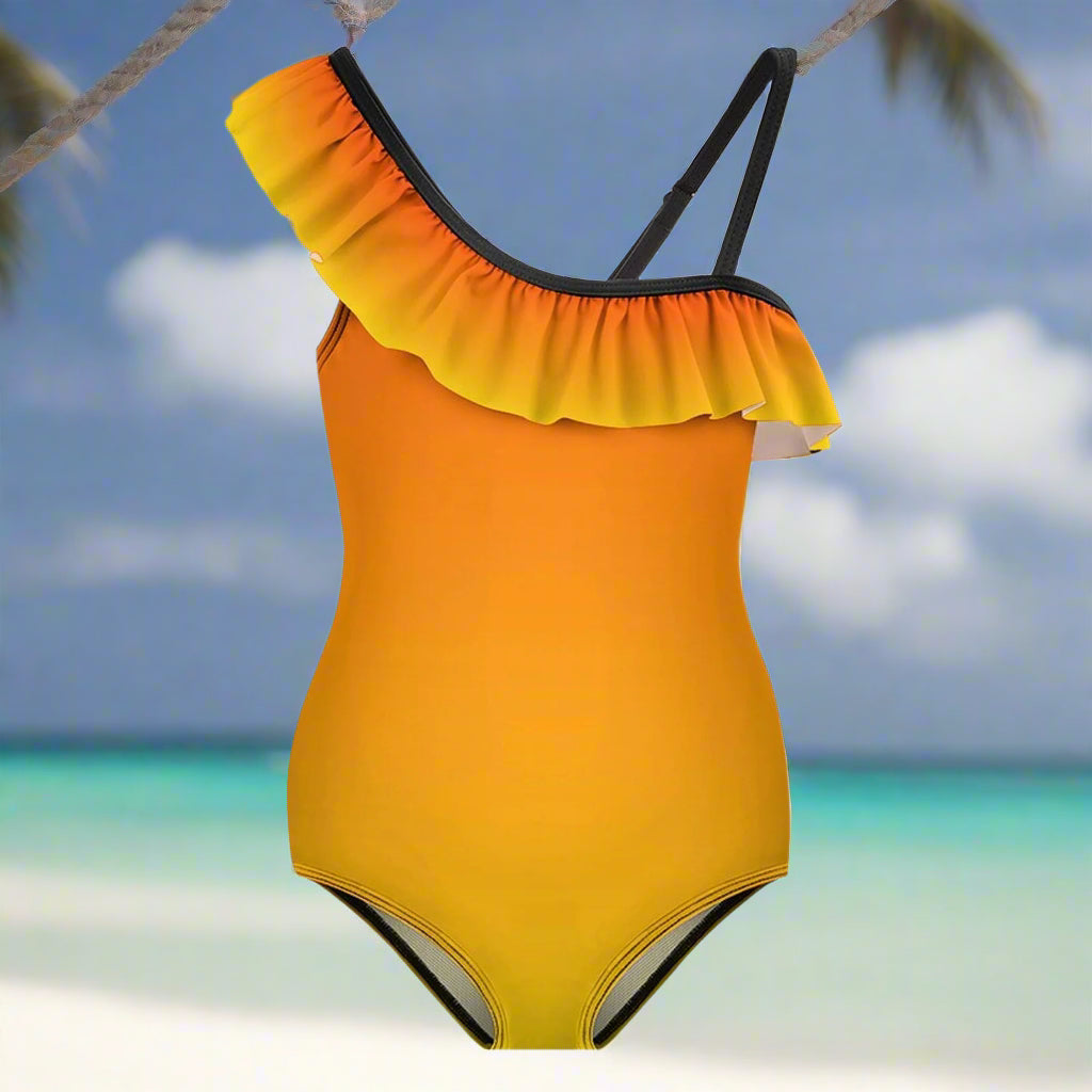 Orange and yellow one-piece swimsuit with ruffled shoulder design Hanging on a line in a beach island paradise