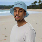 Dune in a slate blue Organic Bucket Hat with Clean Seas Society logo doing his part at a local beach cleaning party
