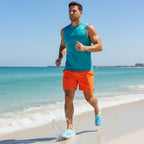 Muscular dude wearing dolphin water shoes, orange shorts and a teal tank top, jogging along the waves in Palm Beach Florida - square format
