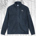 A dark Navy fleece zip-up jacket with a stand collar, shown flat against a white wood plank background with a palm leaf pattern overlay. The jacket features a small white circular logo on the left chest and a small white logo on the right sleeve.