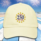 Pastel lemon cap with 'USA 250' text and star design on a beach with fireworks background
