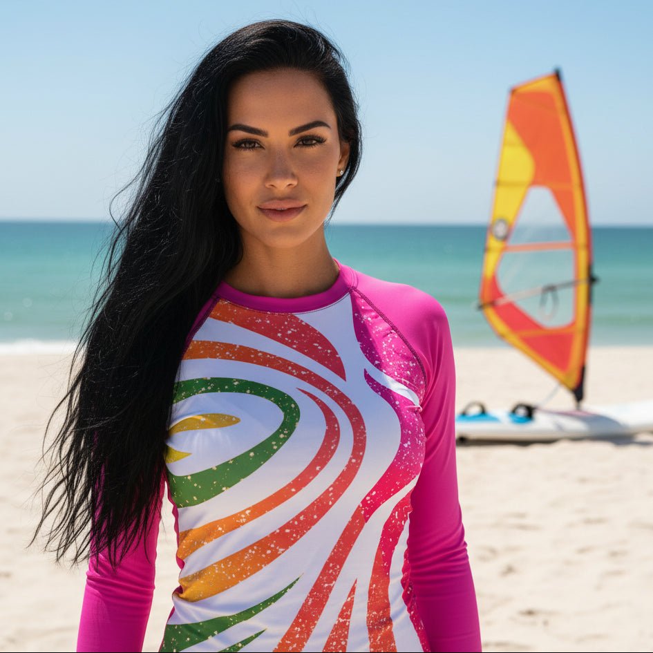 Beautiful Woman in Colorful long-sleeve sun rashie with a vibrant pattern on PCB Florida 