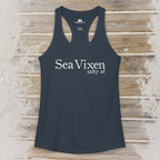 Black tank top with 'Sea Vixen salty af' text on a sandy wood surface