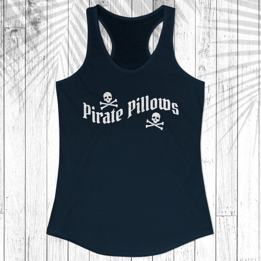 A navy blue racerback tank top with a white graphic of two skeletal hands forming a heart shape on the chest, displayed flat against a white wood plank background with a leaf shadow overlay.