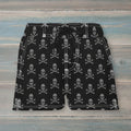 Black shorts with white accents on a rustic wood background
