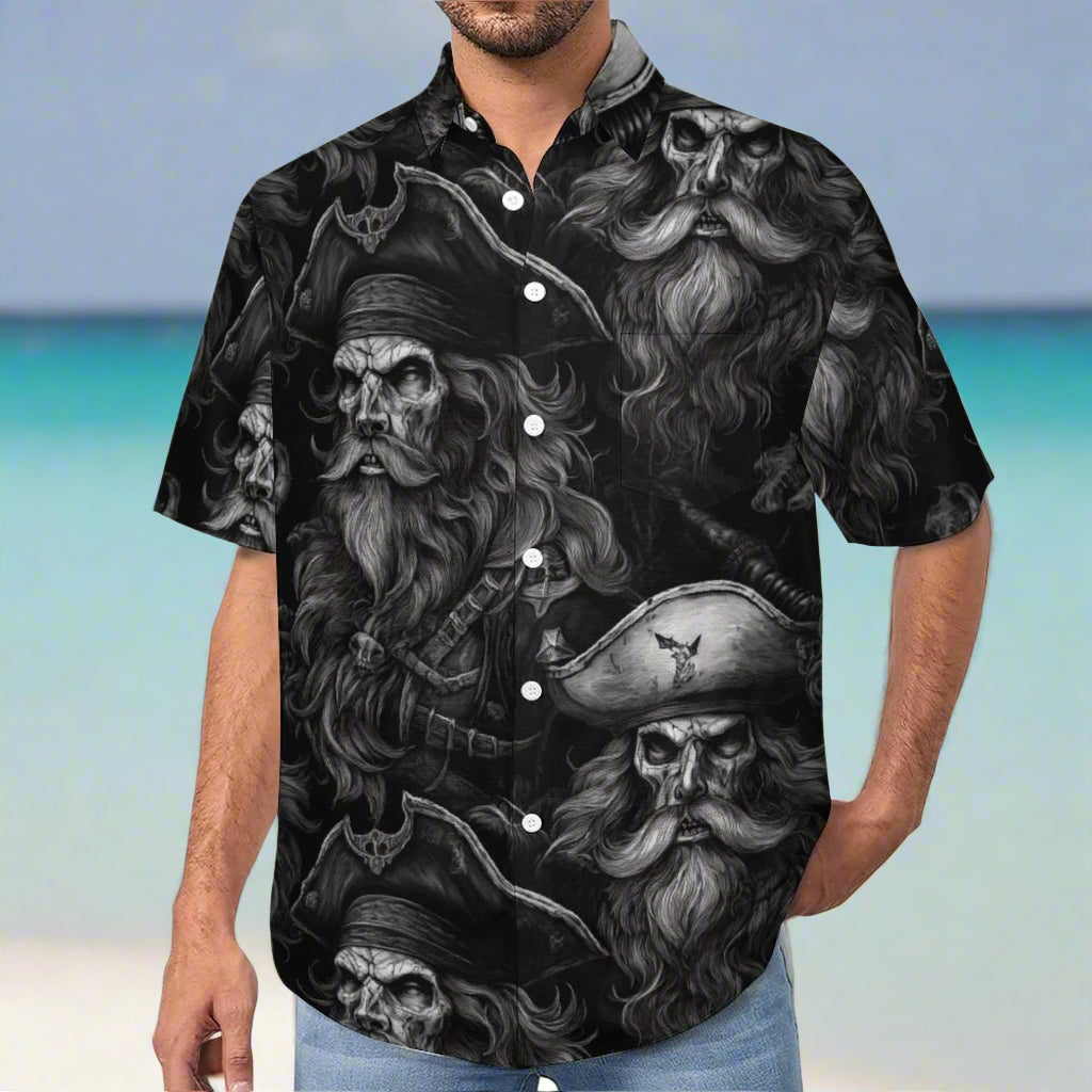 Dude wearing a black and white pirate themed shirt on a beach in Aruba 