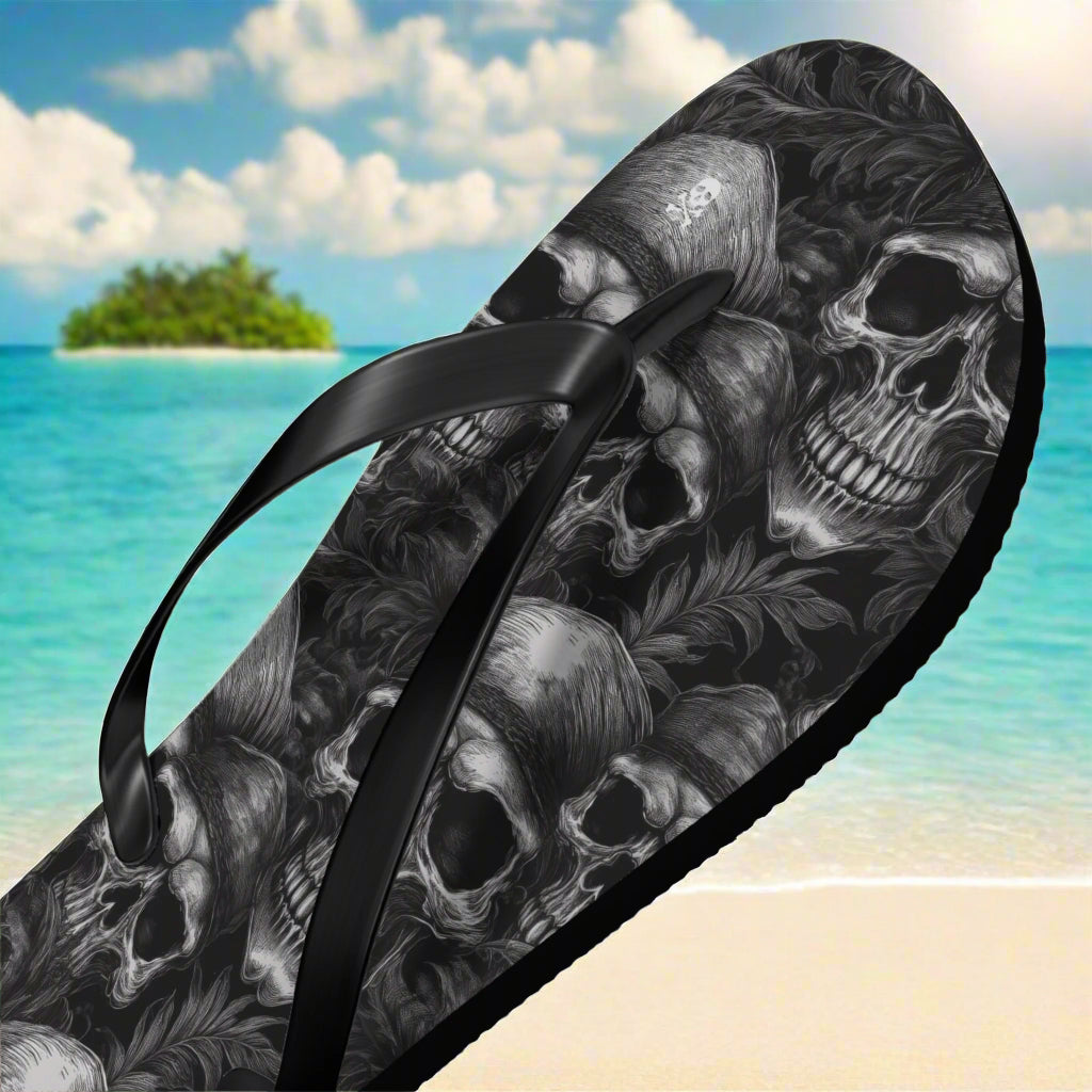 Flip-flop with skull design on a beach background