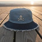 Blue bucket hat with frayed edge on a  beachside boardwalk