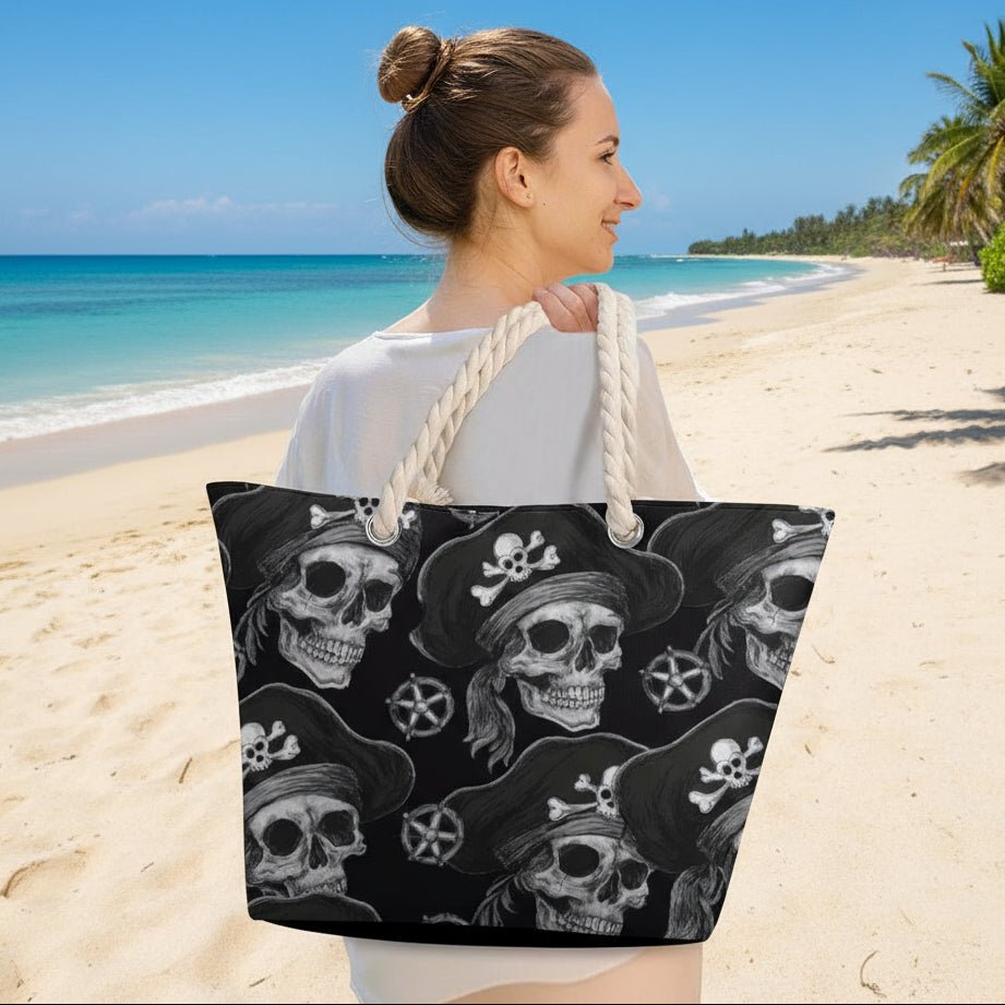 Person holding a tote bag with skull and crossbones design in a park setting