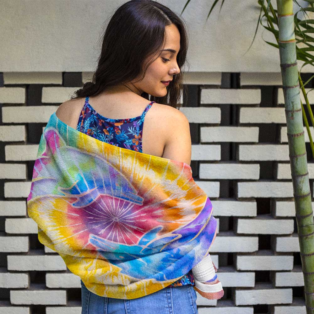Swimwear model wrapped in a Bongo Beachwear Tie Dye Beach Towel