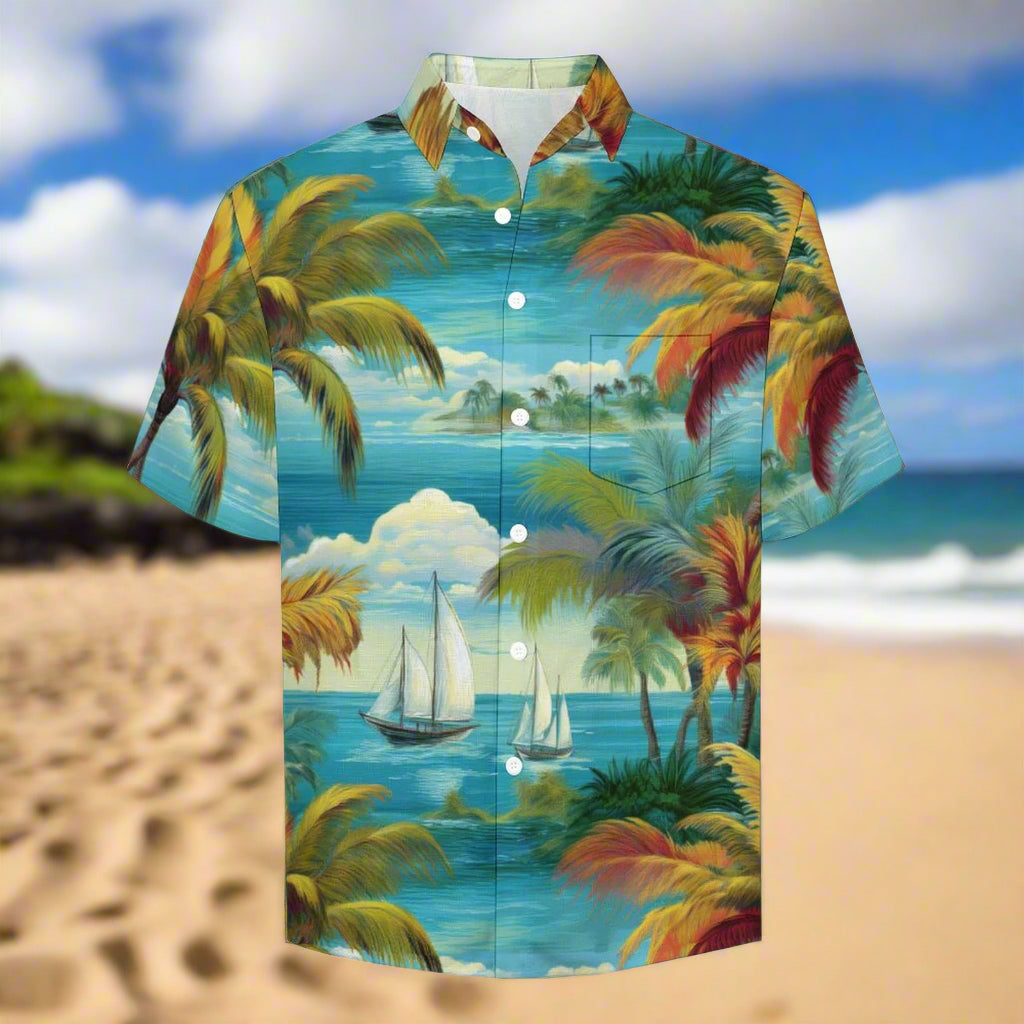 Hawaiian shirt with tropical island design featuring palm trees and sailboats, on a Maui beach backdrop