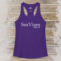 Purple tank top with 'Sea Vixen salty af' text on a wooden surface