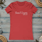 Red t-shirt with 'Sea Vixen salty af' text on a rustic nautical wood background