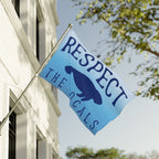 Flag with 'Respect the Locals' text and a silhouette of a person on a building