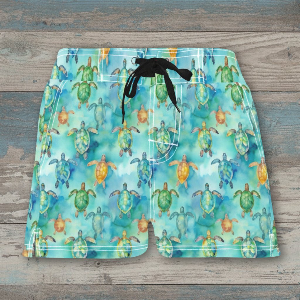 Swim shorts with turtle pattern on a rustic wood background