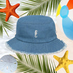 Sea Horse Jean Bucket Hat with embroidery, surrounded by beach elements like starfish and beach ball.