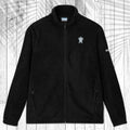 A dark gray fleece zip-up jacket with a stand collar, shown flat against a white wood plank background with a palm leaf pattern overlay. The jacket features a small white circular logo on the left chest and a small white logo on the right sleeve.