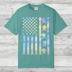 Teal t-shirt with a colorful American flag design featuring turtles on a nautical wood background