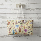 Tote bag with colorful shell pattern on a white background