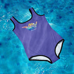 Purple swimsuit with a colorful wave design on a pool floor